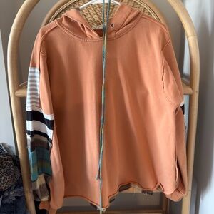 easel Peach Orange Hoodie with Striped Patchwork Sleeves